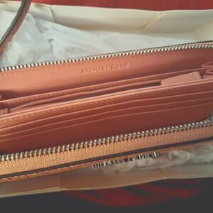 Michael Kors large zip around wristlet, bubble gum pink, alligator pattern,